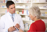 pharmacist assisting her customer